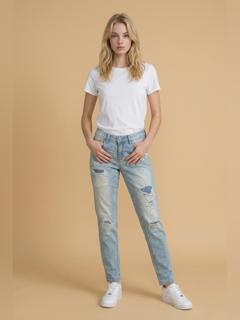 Distressed Patched Light Blue Jeans
